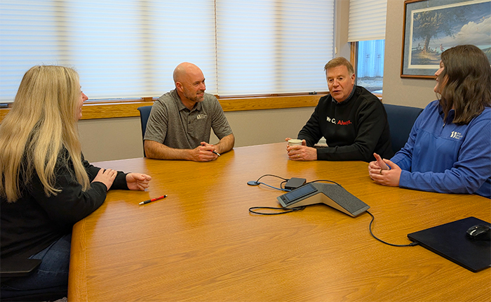 FSB employees gathered in a meeting