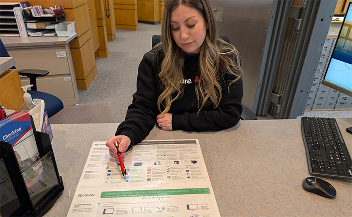 FSB employee walking through account options